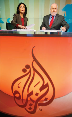 Washington-based TV anchors Marash and Fakry of the Al Jazeera English language network. Photo by Jason Reed/Reuters.