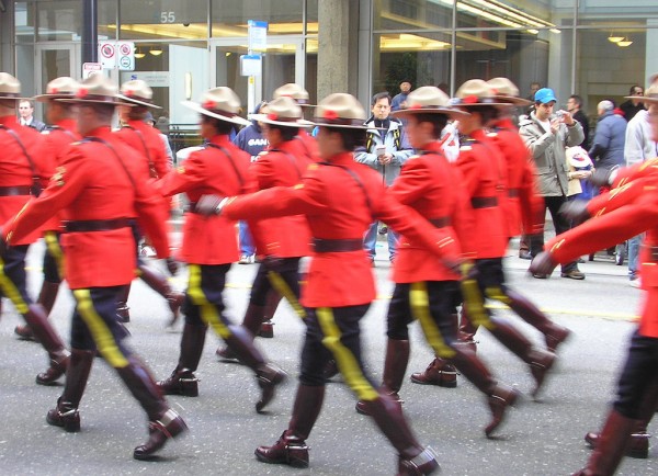 RCMP officers marching on Remembrance Day in Vancouver. Creative Commons photo by Flickr user "SqueakyMarmot"