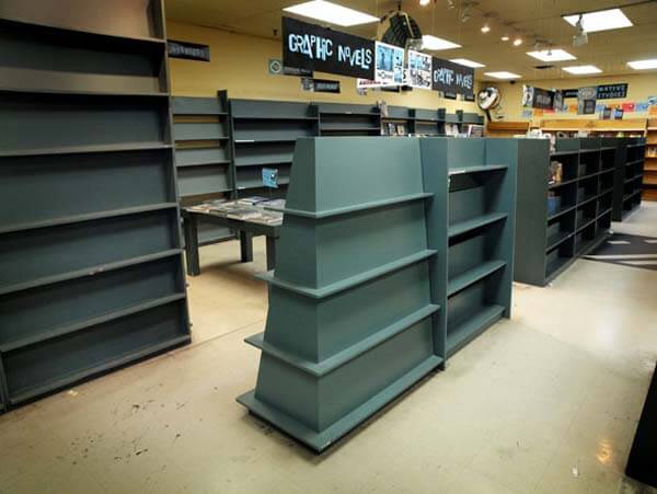 Pages Books' bare shelves in its final days of business. Photo by Rick McGinnis.