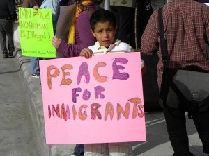 At a protest against Arizona's SB 1070 law that allows police to demand proof of citizenship. Creative Commons photo by Flickr User Fibonnaci Blue.