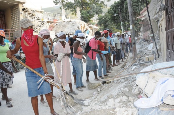 Haitian workers clear rubble from a street following the January 12, 2010 quake that devastated Haiti. Photo courtesy UNDP.