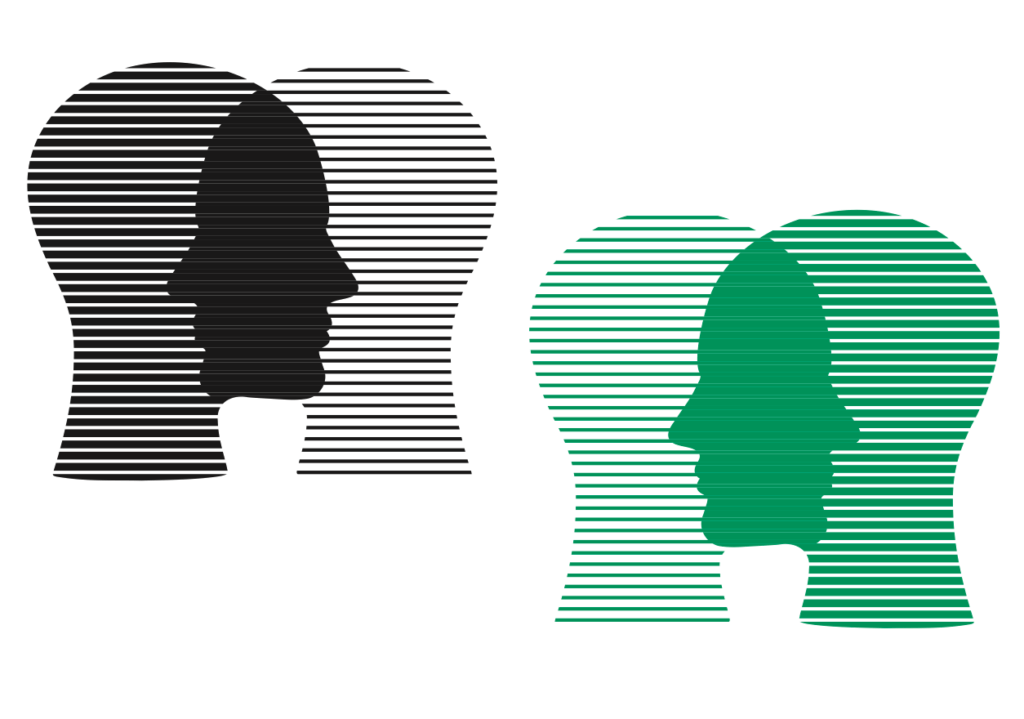 Two heads make copies of themselves, shifting in and out of shape
